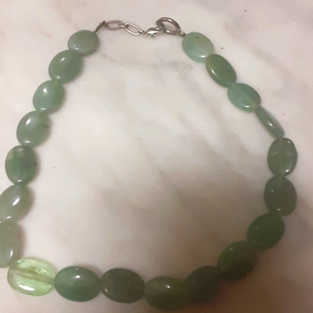 Green 3/4" flat oval beaded necklace. 14" of beads, 16" with extender & clasp.